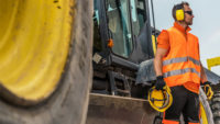 man wearing PPE on a construction site