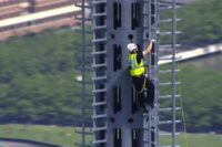 limbing the spire at One World Trade Center.